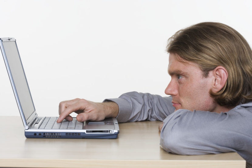 Writing Regrets Man Using Laptop
