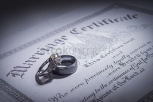 wedding-bands-on-a-marriage-license_1638609